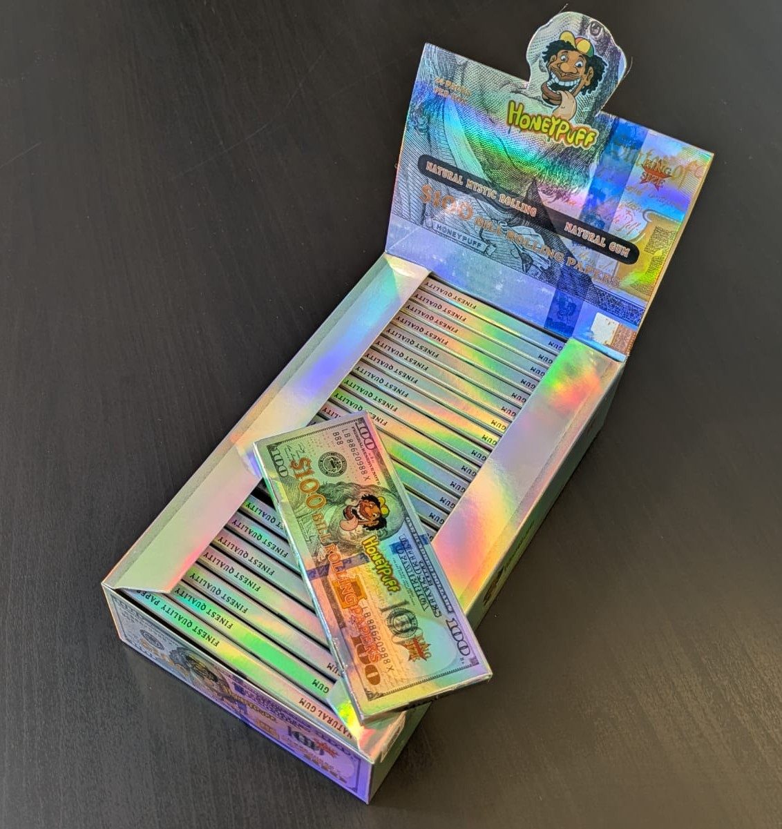 100$ Design Longpapers – geöffnete Box mit Booklets
