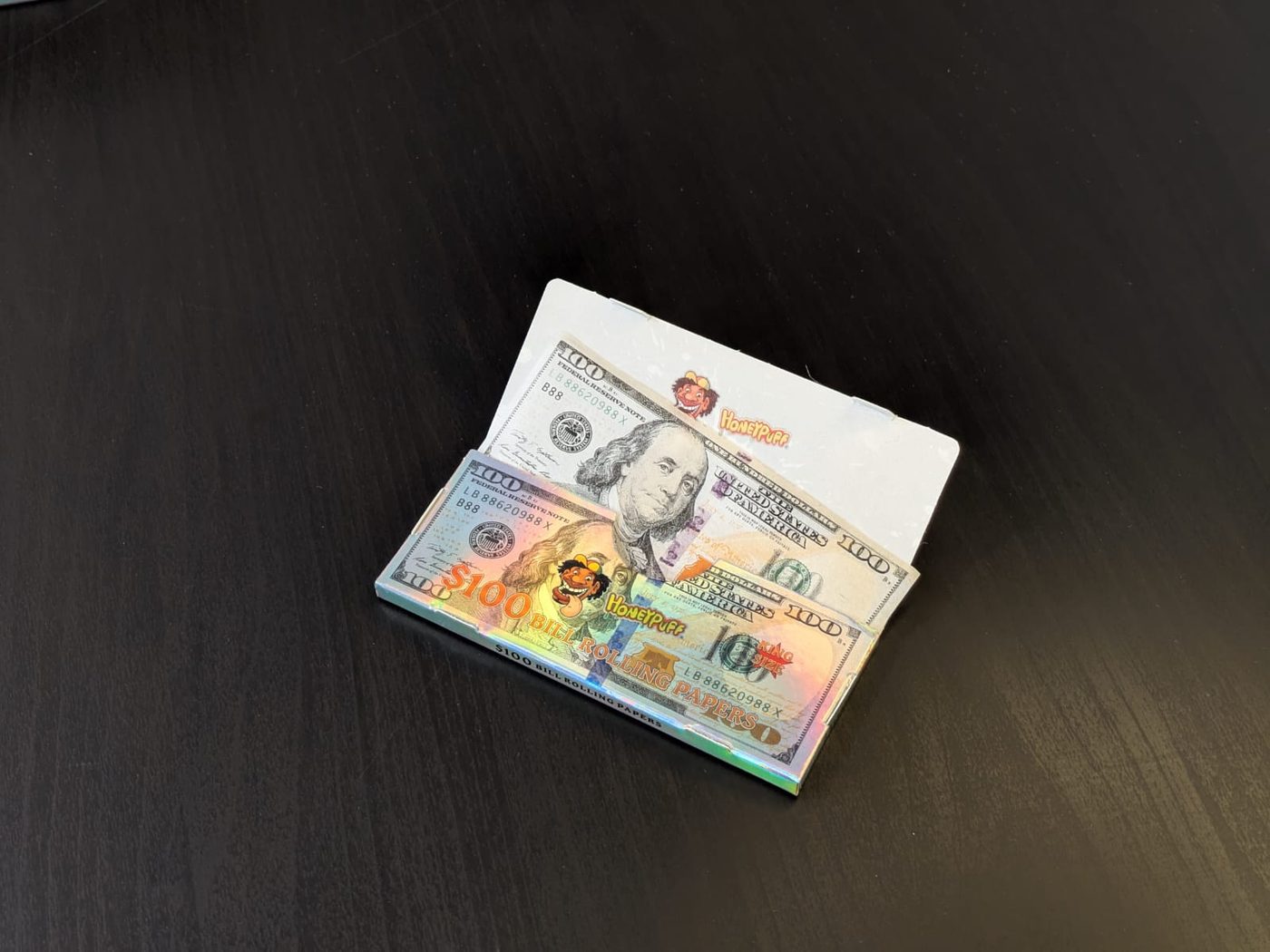 100$ Design Longpapers – geöffnetes Booklet